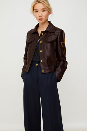 Veste en faux cuir à logo brodé