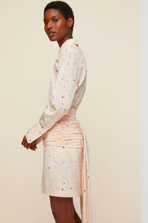 Jupe en soie imprimée à pans drapés