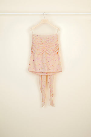 Jupe en soie imprimée à pans drapés