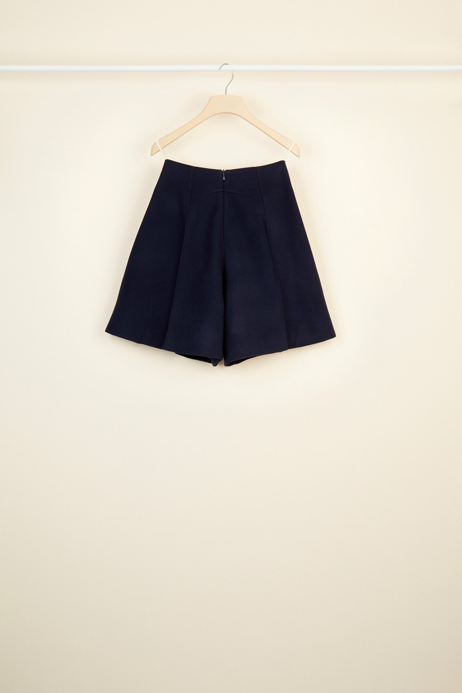 Patou - Iconic cashmere and wool shorts - Navy - High-shine buttons brighten up dark wool.Patou’s iconic tailored shorts in navy cashmere and wool flannel. High-waisted style with two rows of engraved gold-coloured buttons at the sides. Large side pockets. Concealed zip fastening at the back. Lined.