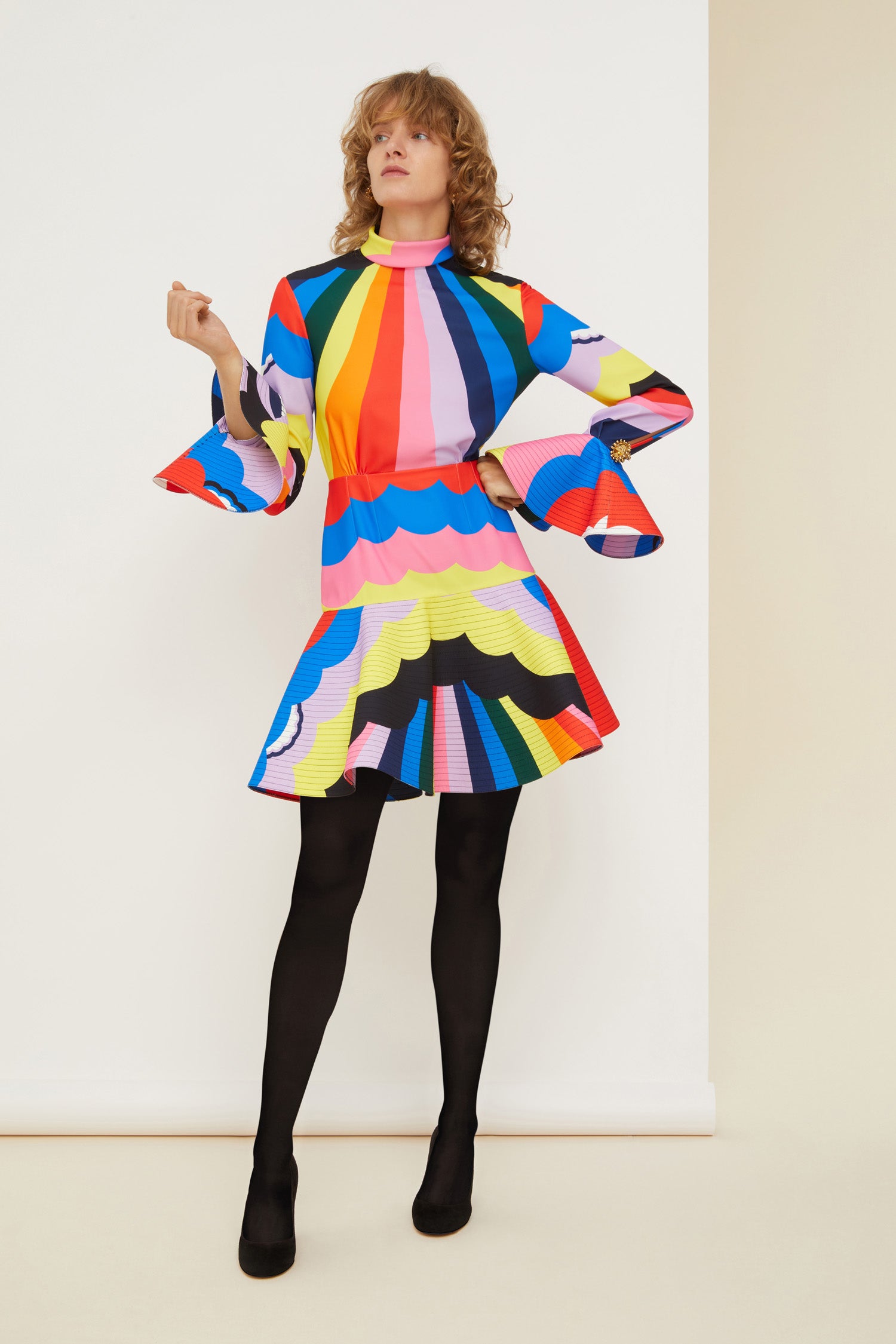 Patou - Psychedelic high neck 3D mini dress - A Psychedelic World - Dreaming a life in Patou and in Technicolor.Multicoloured recycled cady 3D mini dress. Featuring Act 1’s hand-drawn psychedelic-style print. High neck with a zip fastening at the back. Circular cuffs with topstitching detailing and topstitched hem to create extra volume. Engraved gold-coloured buttons at the cuffs. Signature curved seam at the back. Brooches sold separately.