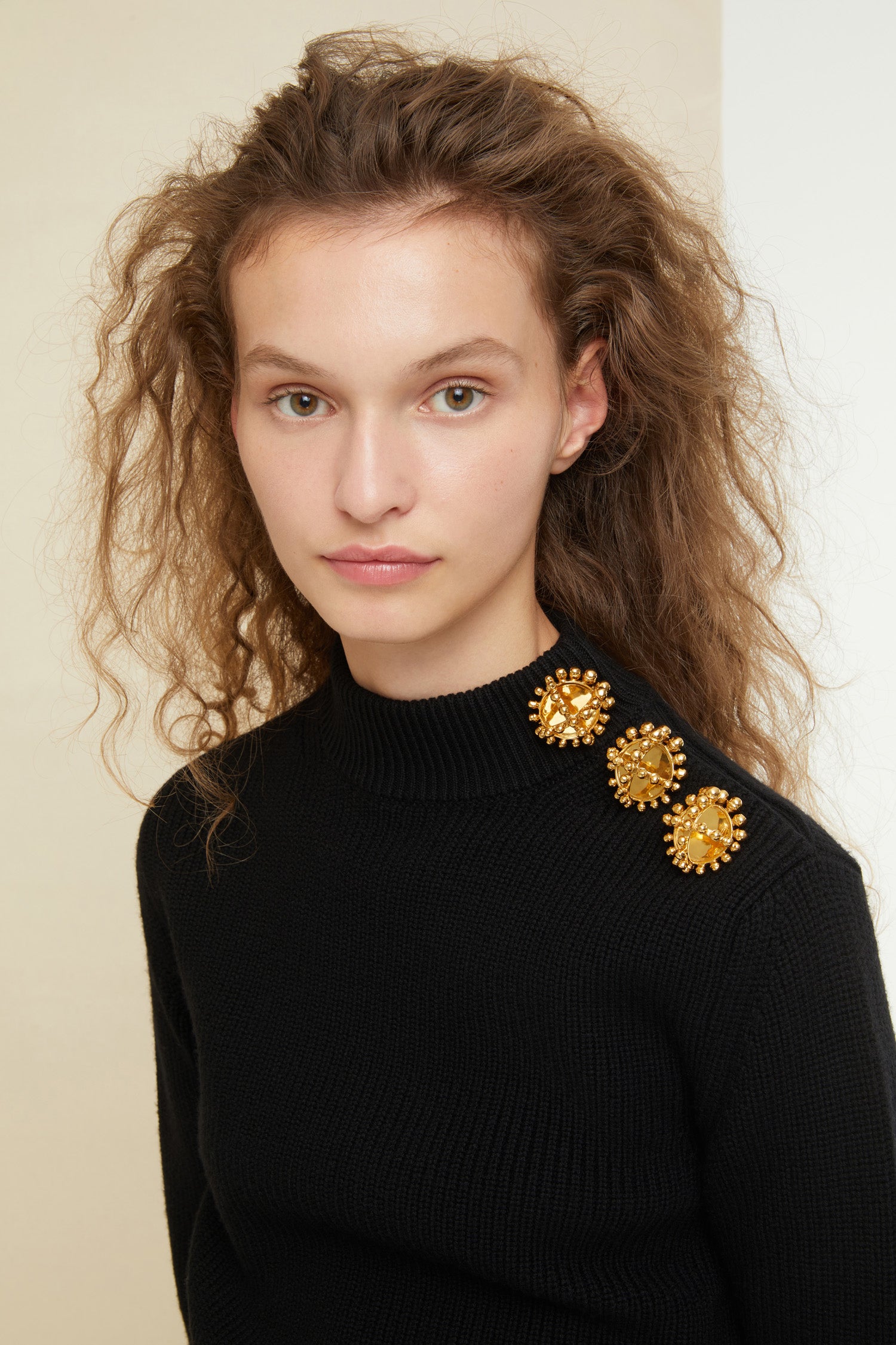 Patou - Brooch button Breton knit - Black - A button? No, make it a brooch! That’s so Patou. Black wool Breton jumper. Slightly cropped silhouette with three-quarter sleeves. Gold-coloured brooches and concealed press buttons on the left shoulder.