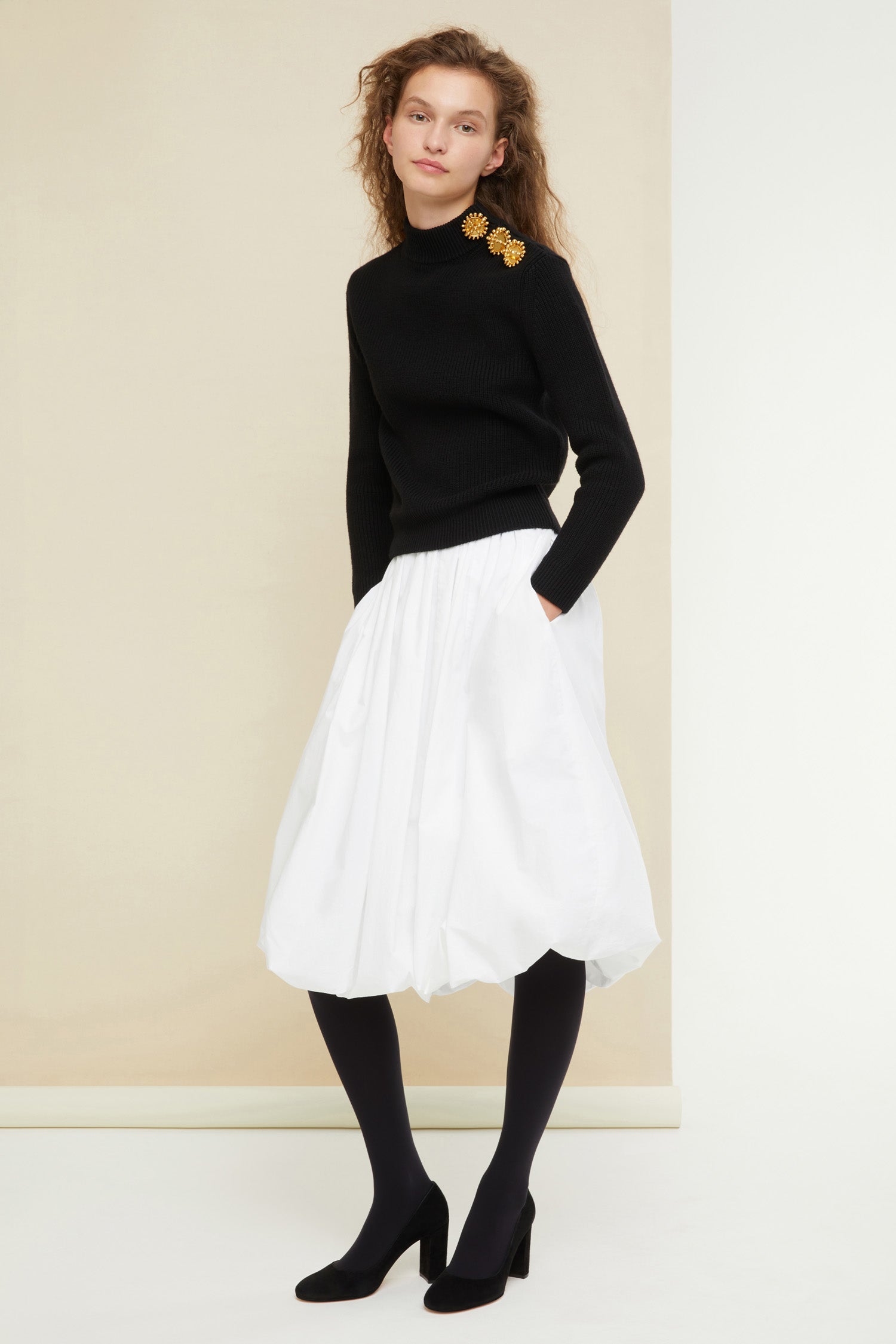 Patou - Brooch button Breton knit - Black - A button? No, make it a brooch! That’s so Patou. Black wool Breton jumper. Slightly cropped silhouette with three-quarter sleeves. Gold-coloured brooches and concealed press buttons on the left shoulder.