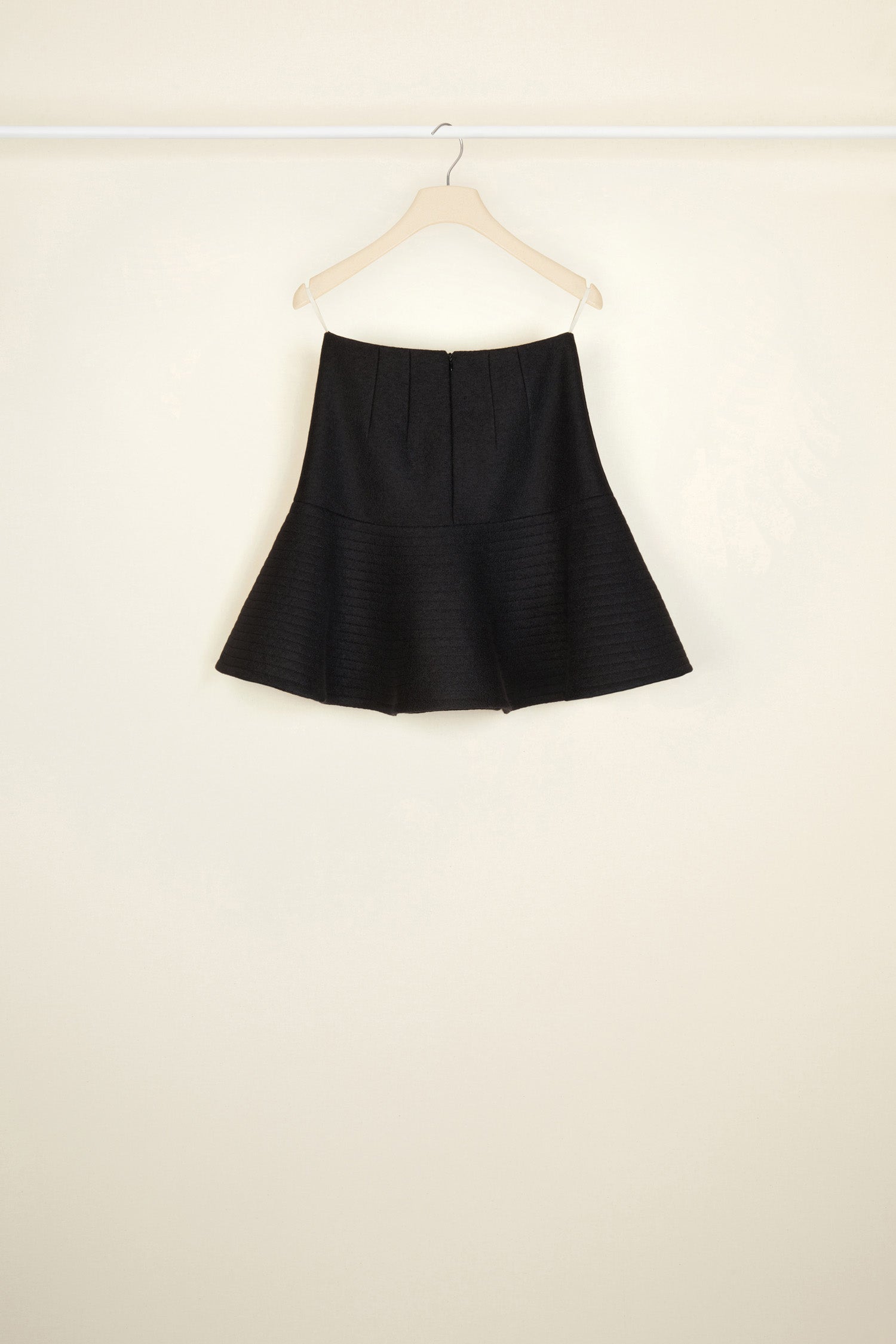 Patou - 3D mini skirt - Black - Oui, oui, oui: three cheers for the 3D mini!Black boiled wool 3D mini skirt. Godet silhouette. Topstitching all over to create a voluminous wavy effect. Darts at the front and back. Zip fastening at the back.