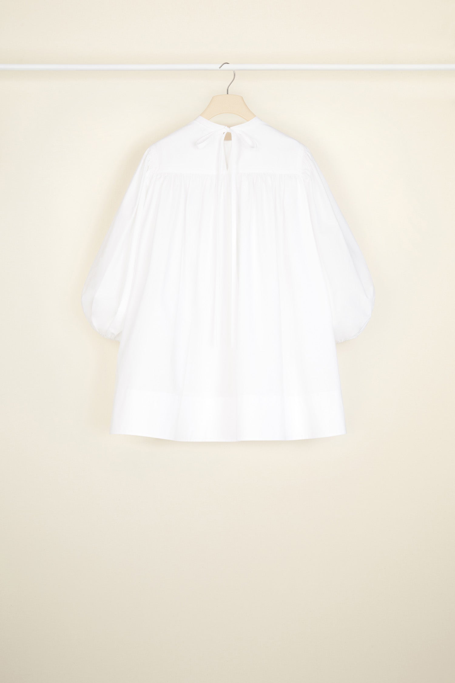 Patou - Communion cotton top - White - Fine details that speak volumes.White organic cotton poplin top. Oversized silhouette. Round collar with yoke and tie fastening at the back. Puff sleeves with elasticated cuffs.
