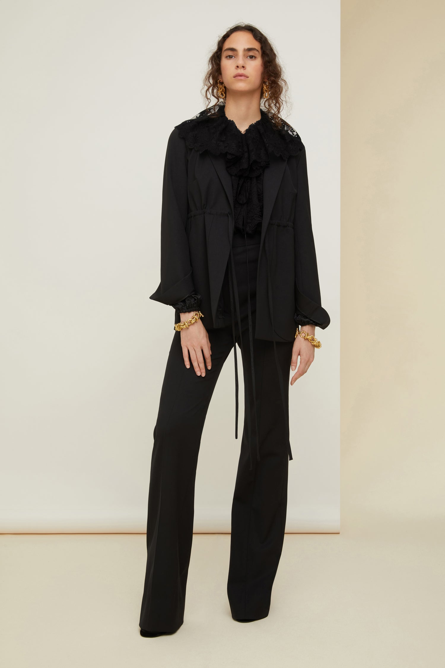 Patou - Drawstring wool jacket - Black - Subtly cinched, unmistakably Patou.Black stretch virgin wool jacket. Notch lapels. Adjustable drawstring at the waist that fastens at the front. Large pockets with curved seams. Split cuffs. Single vent at the back.