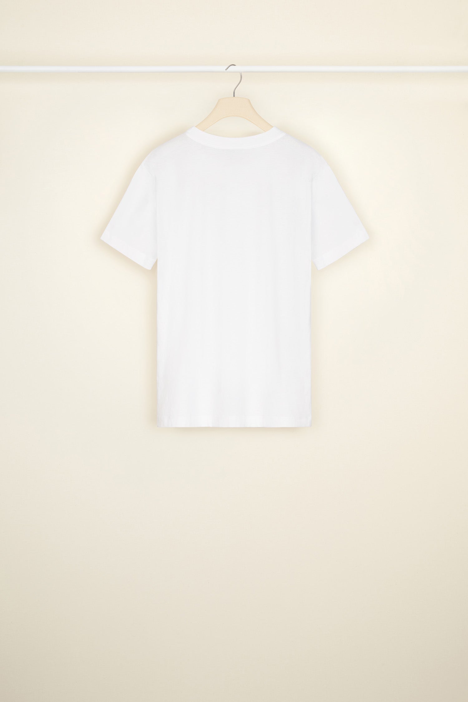 Patou - Embroidered T-shirt in organic cotton - White - An embroidery masterclass, a simple white tee with the mark of Patou high class. White organic cotton t-shirt. Crewneck style. Regular fit. Navy and red embroidery featuring a JP logo, paisley-style shapes, a heart and a floral-inspired pattern.