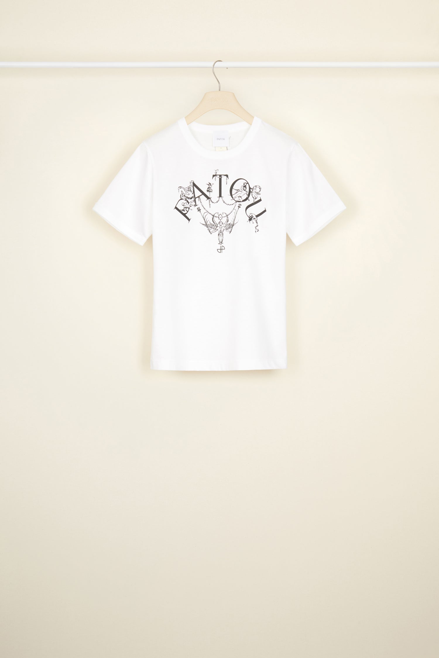 Patou - T-shirt Patou « Contes et légendes » en coton bio - White - Le logo Patou, une signature familière en version légendaire.T-shirt en coton bio blanc. Col rond. Logo Patou revisité orné de personnages et détails issus de l’imprimé « Contes et légendes ». Monogramme JP.