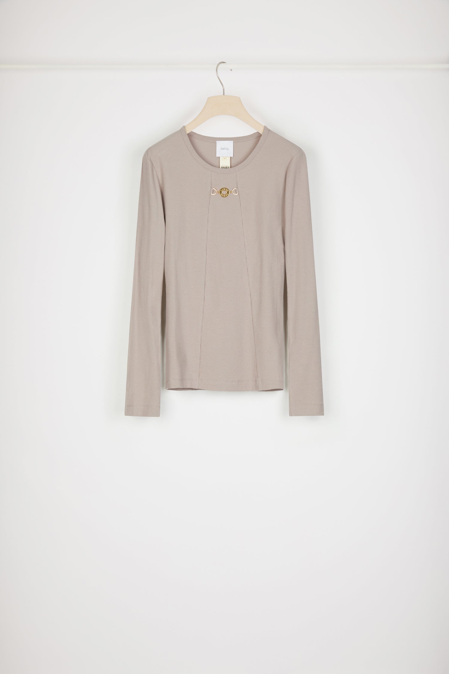 Patou - Medallion-embellished top in organic cotton - Parchment - A darling new bijou that is so very Patou.Parchment beige organic cotton top. Ribbed fabric. Scoop neckline. Long sleeves. Gold-tone Patou-engraved medallion embellishment at the front. Two seams down the front. The ornament can be removed.