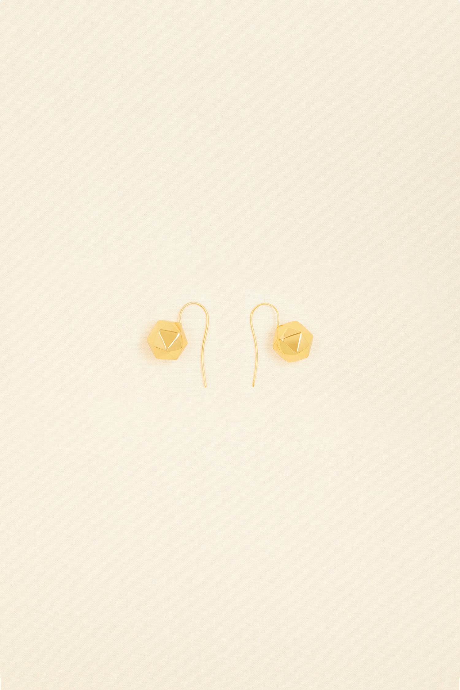 Patou - Faceted bead brass earrings - Gold - A multi-faceted bead to reflect all your moods. Gold-plated brass pendant earrings. Faceted bead attached to a hook.