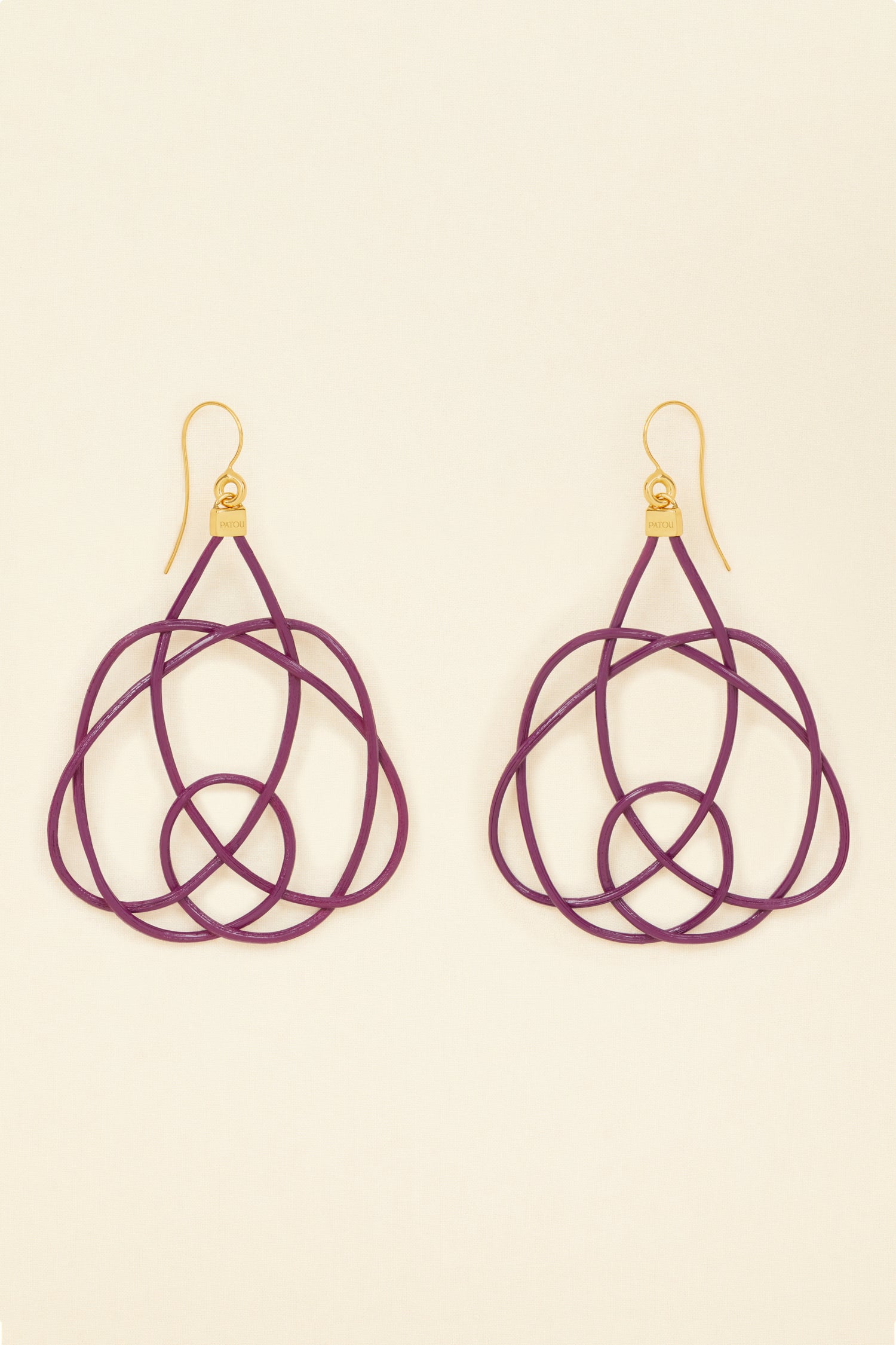Patou - Wicker earrings - Anemone - Lighter, brighter, our favourite earrings are made of wicker.Anemone purple painted wicker earrings. Symmetric curved shape. Hook fastening suitable for pierced ears.