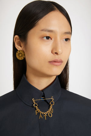Patou brooch in gold-plated brass