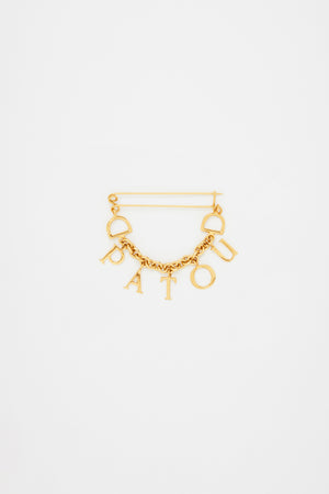 Patou brooch in gold-plated brass