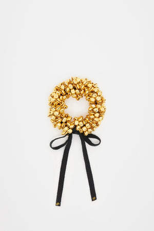 Bracciale con campanine in ferro dorato