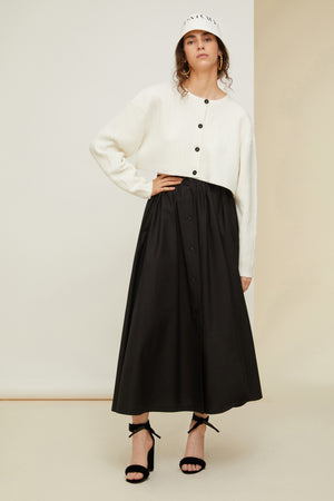 Cropped cable knit cardigan in recycled wool blend