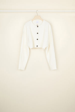 Cropped cable knit cardigan in recycled wool blend