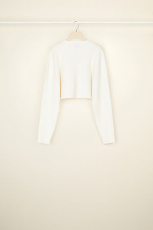 Cropped cable knit cardigan in recycled wool blend