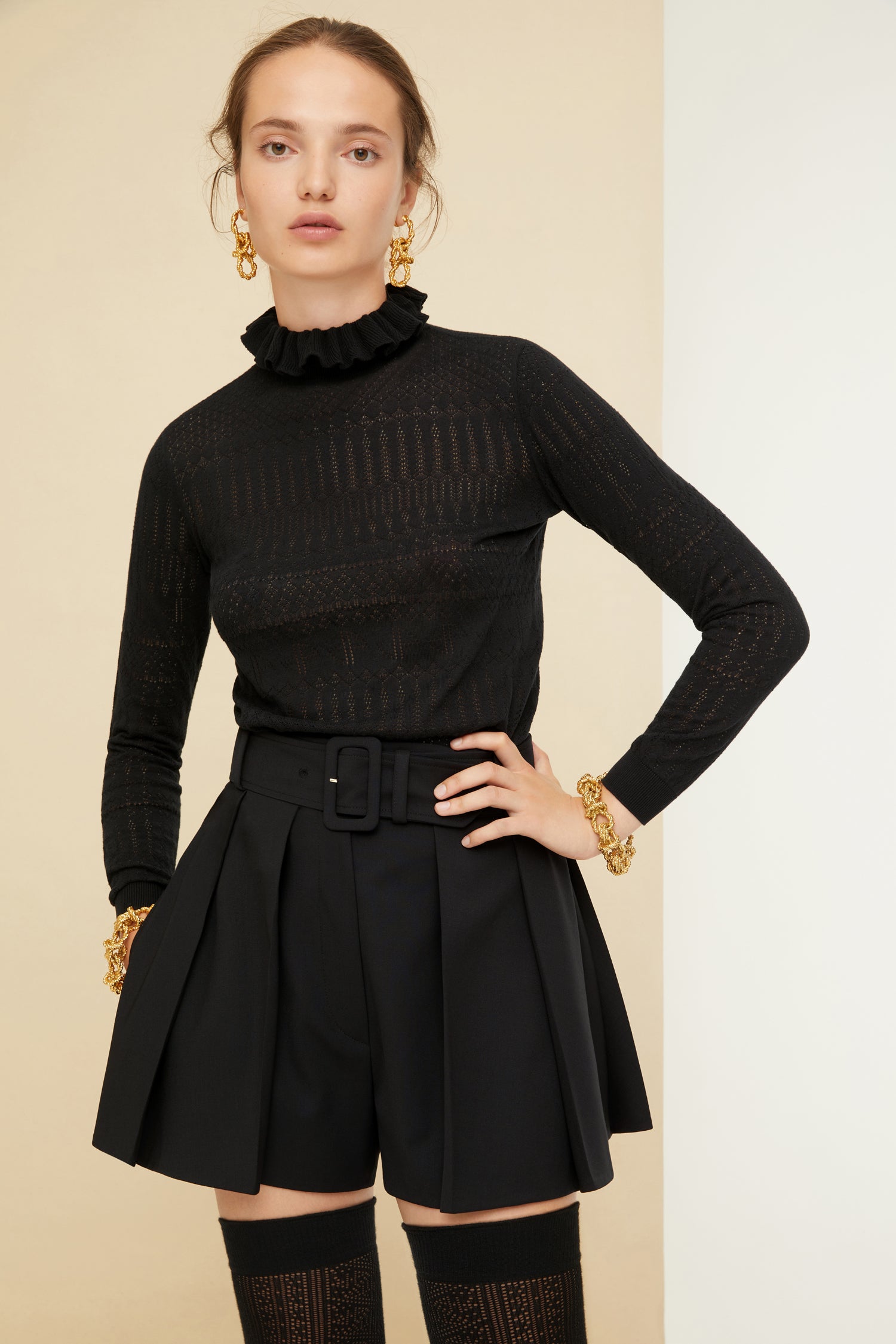 Patou - Ruffle collar open knit jumper in organic cotton - Black - Open stitching, open hearts!Black organic cotton jumper. Open knit with JP logo detailing. Ruffle collar. Ribbed cuffs and waist.