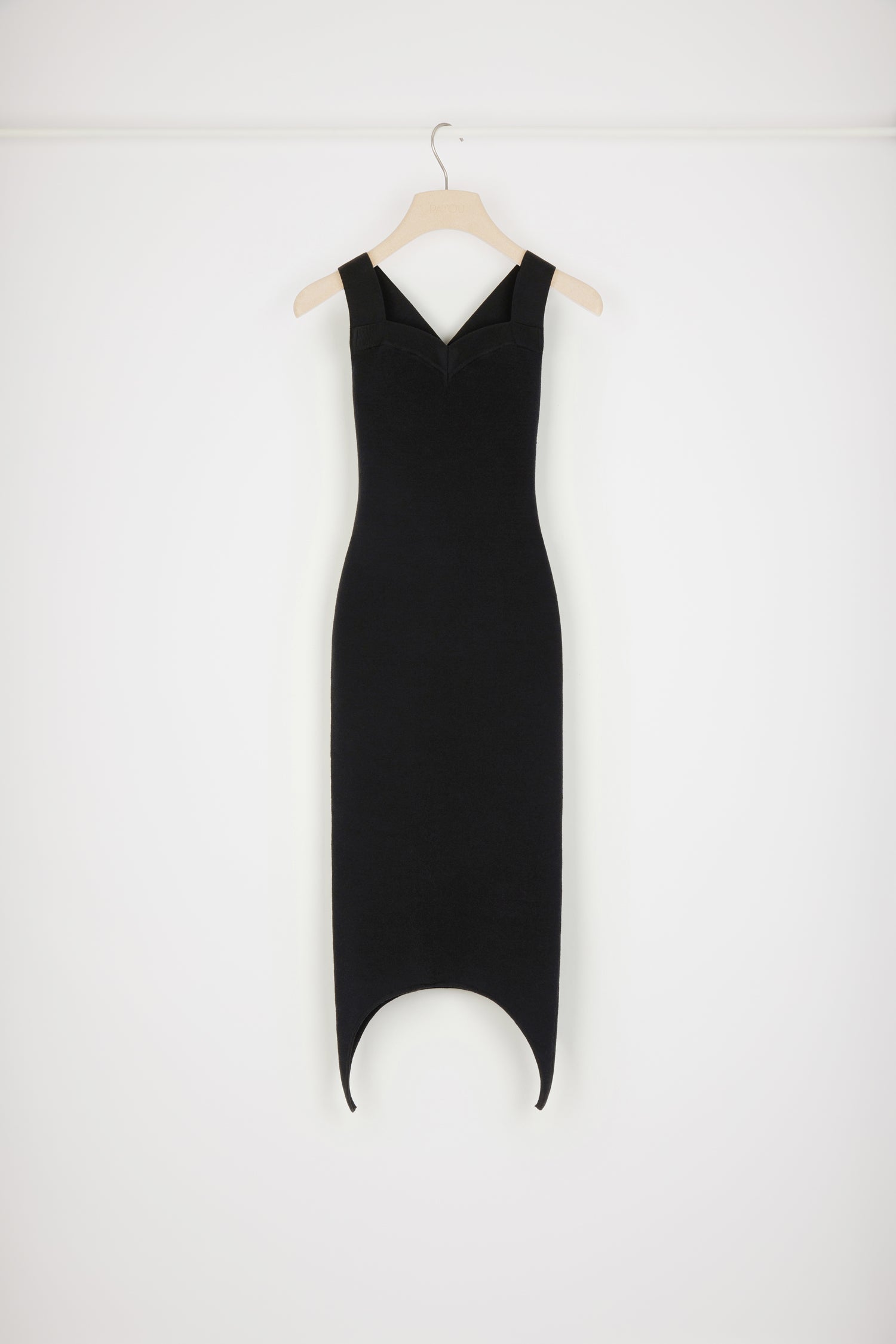 Patou - Curve hem knit dress in wool blend - Black - The new Patou hemline offers a masterclass in sophisticated seduction.Black wool blend dress. Fitted style. Wide straps that cross at the back. Sweetheart neckline. Zip fastening at the back. Curved hem.This dress is very skin-tight.