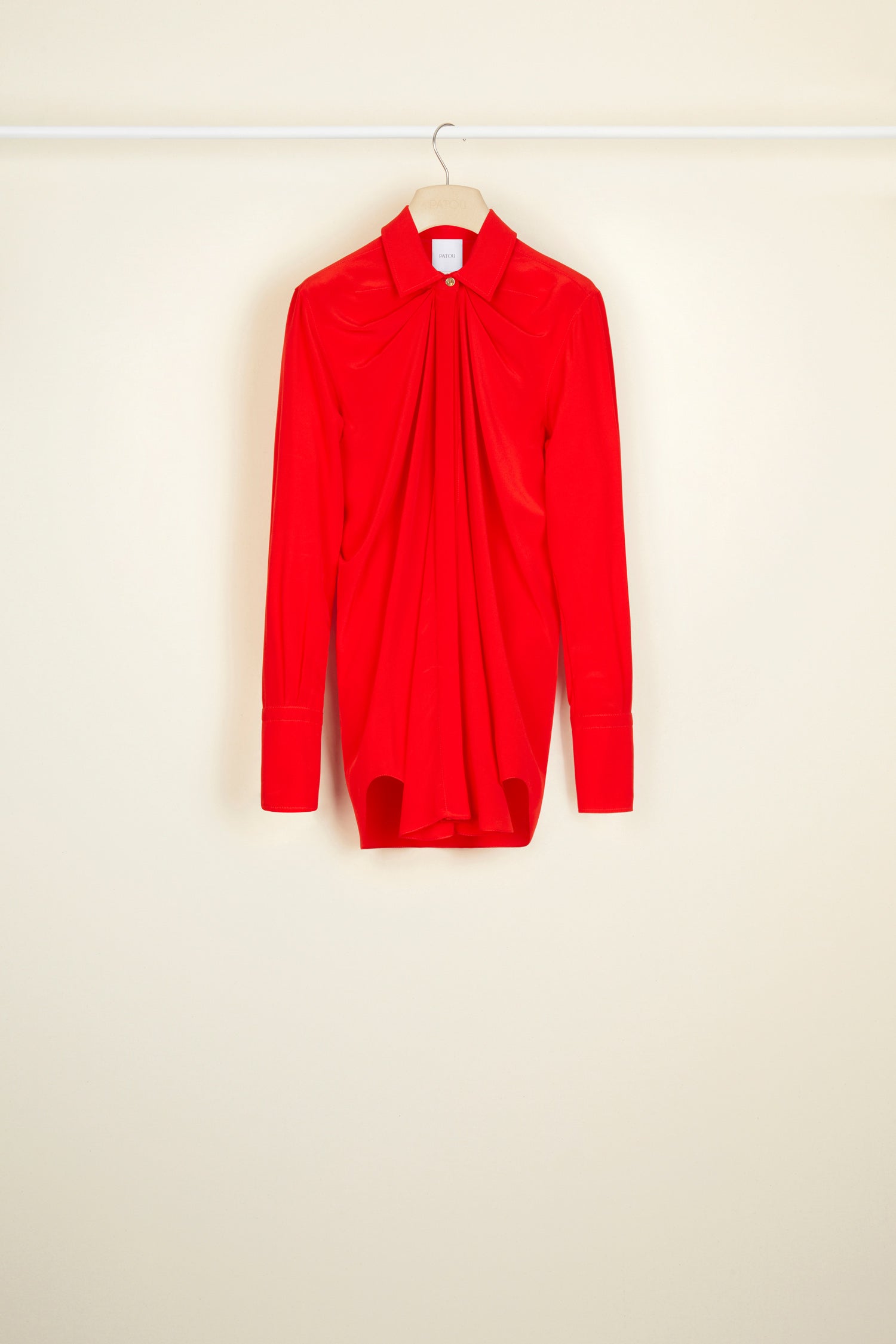 Patou - Draped silk blouse - Poppy - A masterclass in draping.Poppy silk crepe blouse. Longline draped silhouette with shirring at the neckline. Engraved gold-coloured buttons at the collar and cuffs ; concealed button fastening. Signature curved seam at the back.