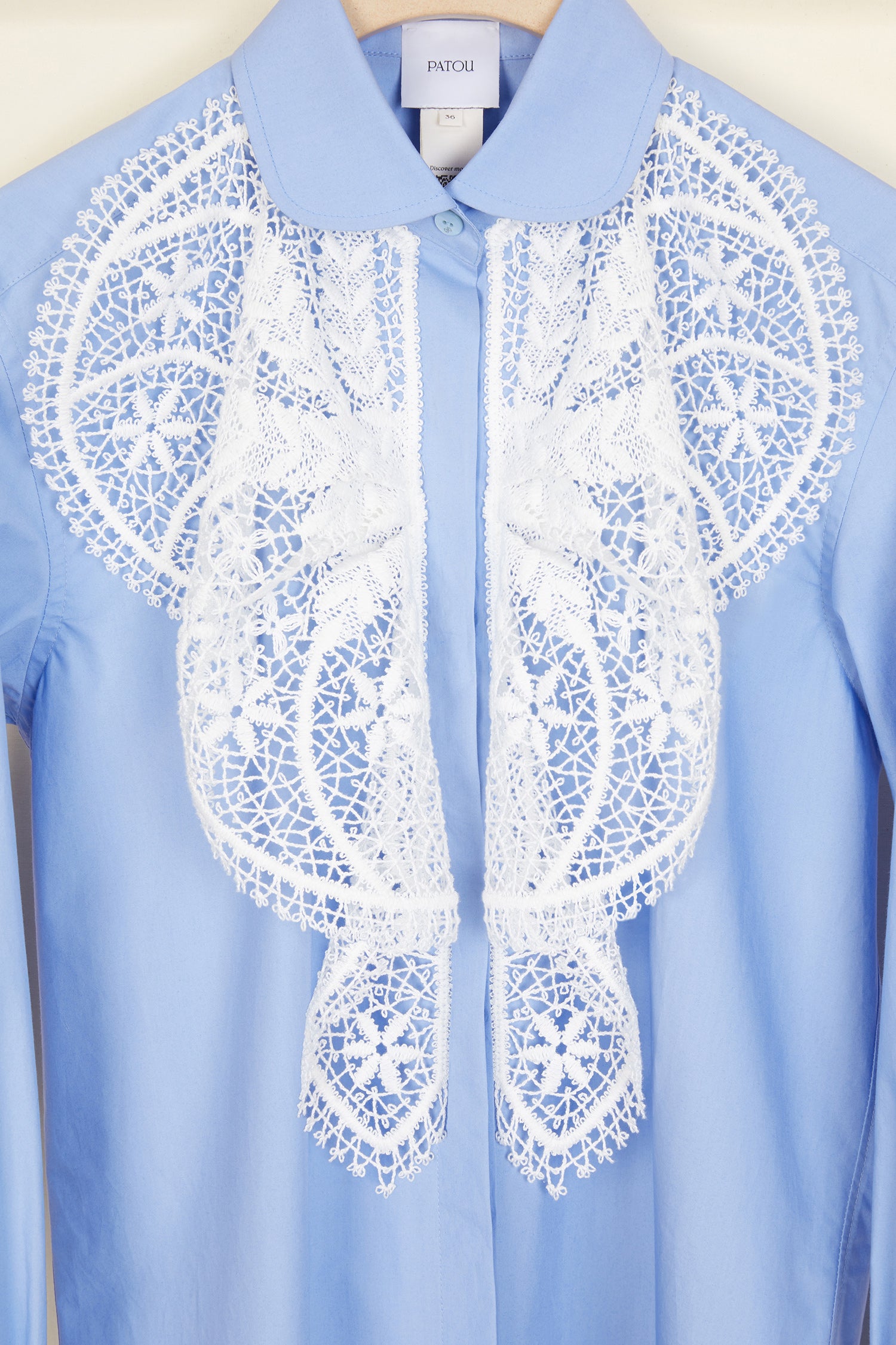 Patou | Blue cotton poplin shirt with white floral lace bib