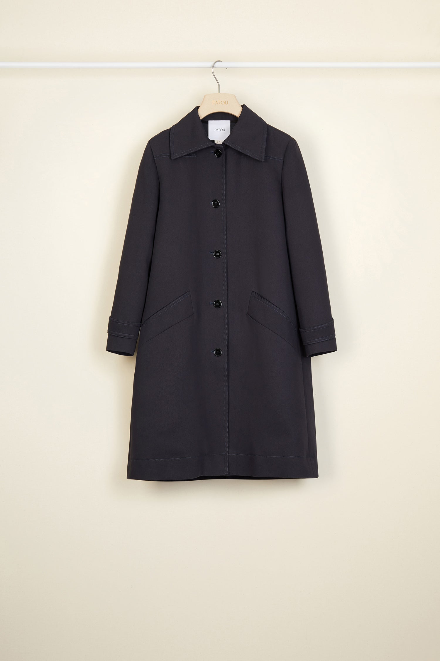 Patou - Ruffle hem gabardine coat - Storm - No frills? No thank you!Storm cotton gabardine overcoat. Straight silhouette, raglan sleeves. Button fastening. Two side pockets. Buttoned tabs on the cuffs. Detachable ruffle hem.