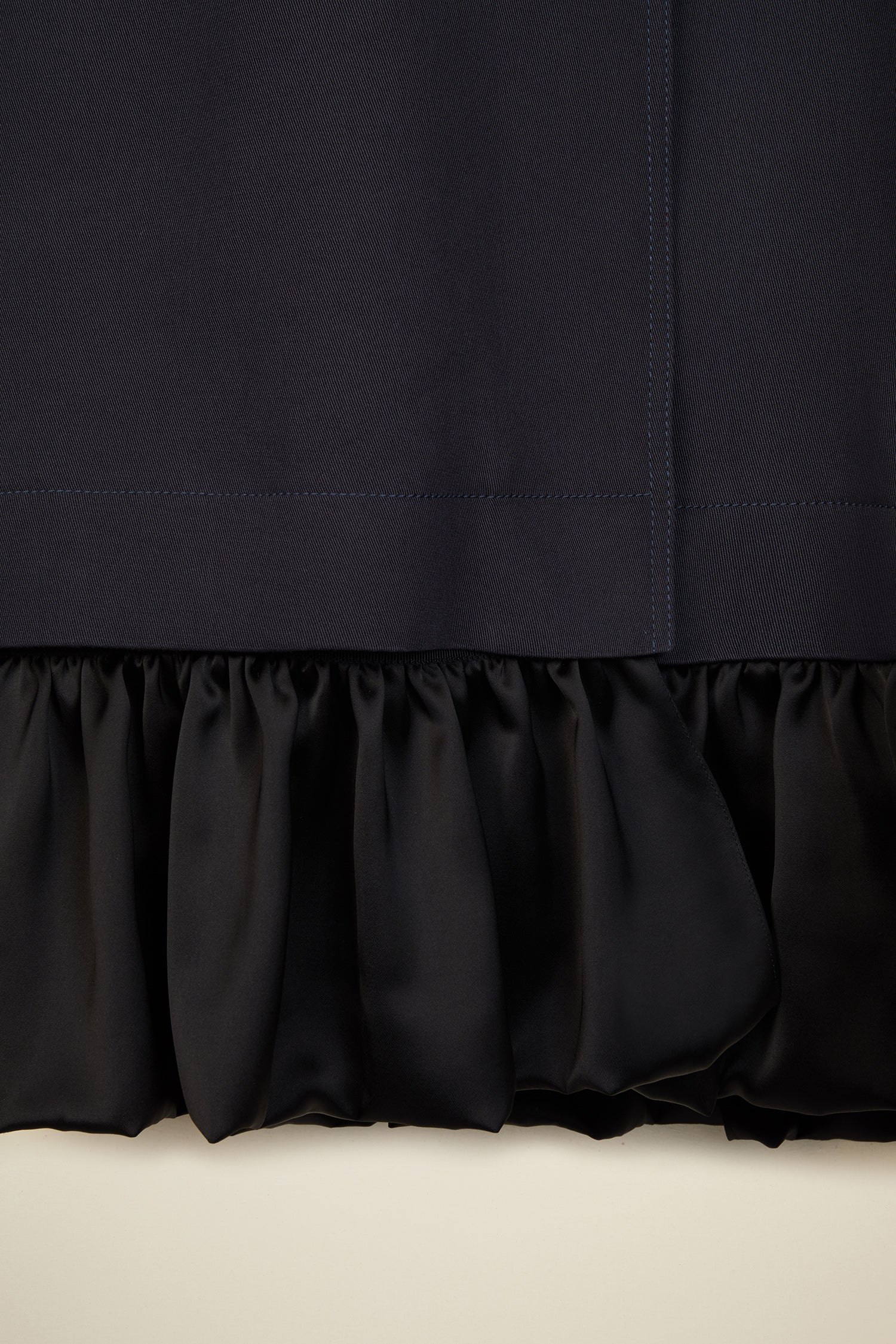 Patou - Ruffle hem gabardine coat - Storm - No frills? No thank you!Storm cotton gabardine overcoat. Straight silhouette, raglan sleeves. Button fastening. Two side pockets. Buttoned tabs on the cuffs. Detachable ruffle hem.
