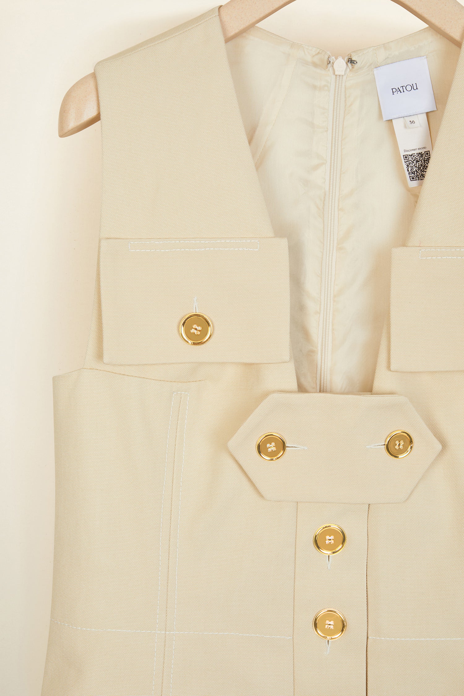 Patou - Cotton safari dress - Vanilla - Variations on the saharienne.Vanilla Panama cotton safari dress. Slight A-line silhouette with a boxy fit. Flap pockets on the chest. JP logo-engraved gold-coloured buttons all over. Removable button tab. Two pockets at the sides. Fully lined.