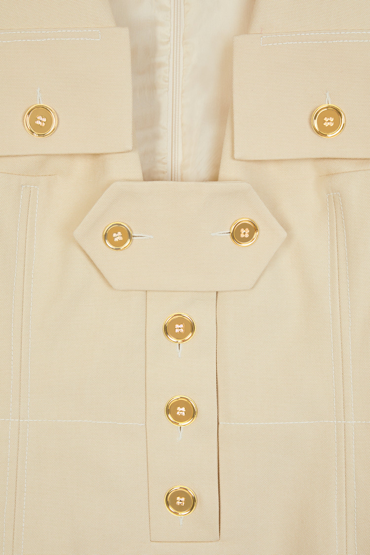 Patou - Cotton safari dress - Vanilla - Variations on the saharienne.Vanilla Panama cotton safari dress. Slight A-line silhouette with a boxy fit. Flap pockets on the chest. JP logo-engraved gold-coloured buttons all over. Removable button tab. Two pockets at the sides. Fully lined.