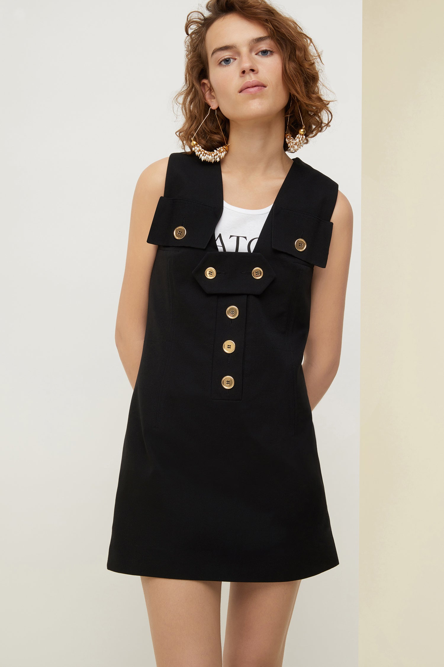 Patou - Cotton safari dress - Black - Variations on the saharienne.Black Panama cotton safari dress. Slight A-line silhouette with a boxy fit. Flap pockets on the chest. JP logo-engraved gold-coloured buttons all over. Removable button tab. Two pockets at the sides. Fully lined.