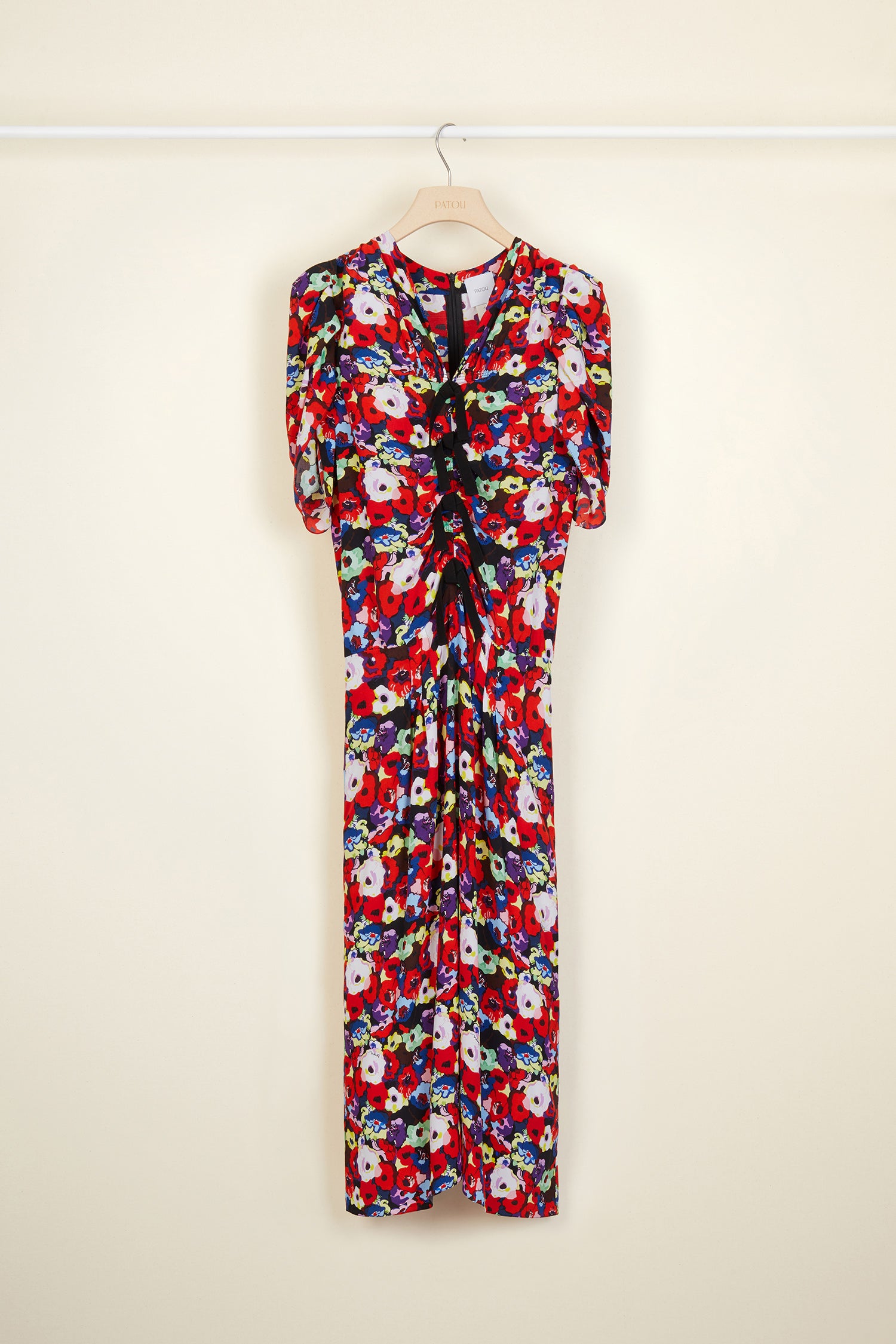Patou - Bow-embellished floral ruched dress - A Thousand Flowers Bloom Print - Bows and blooms. Ruched dress in this season&amp;#39;s signature &amp;quot;A Thousand Flowers Bloom&amp;quot; print. Multiple black bows at the front. Short tulip sleeves. Zip fastening at the back. Long skirt with pleats at the front and box pleat at the back.