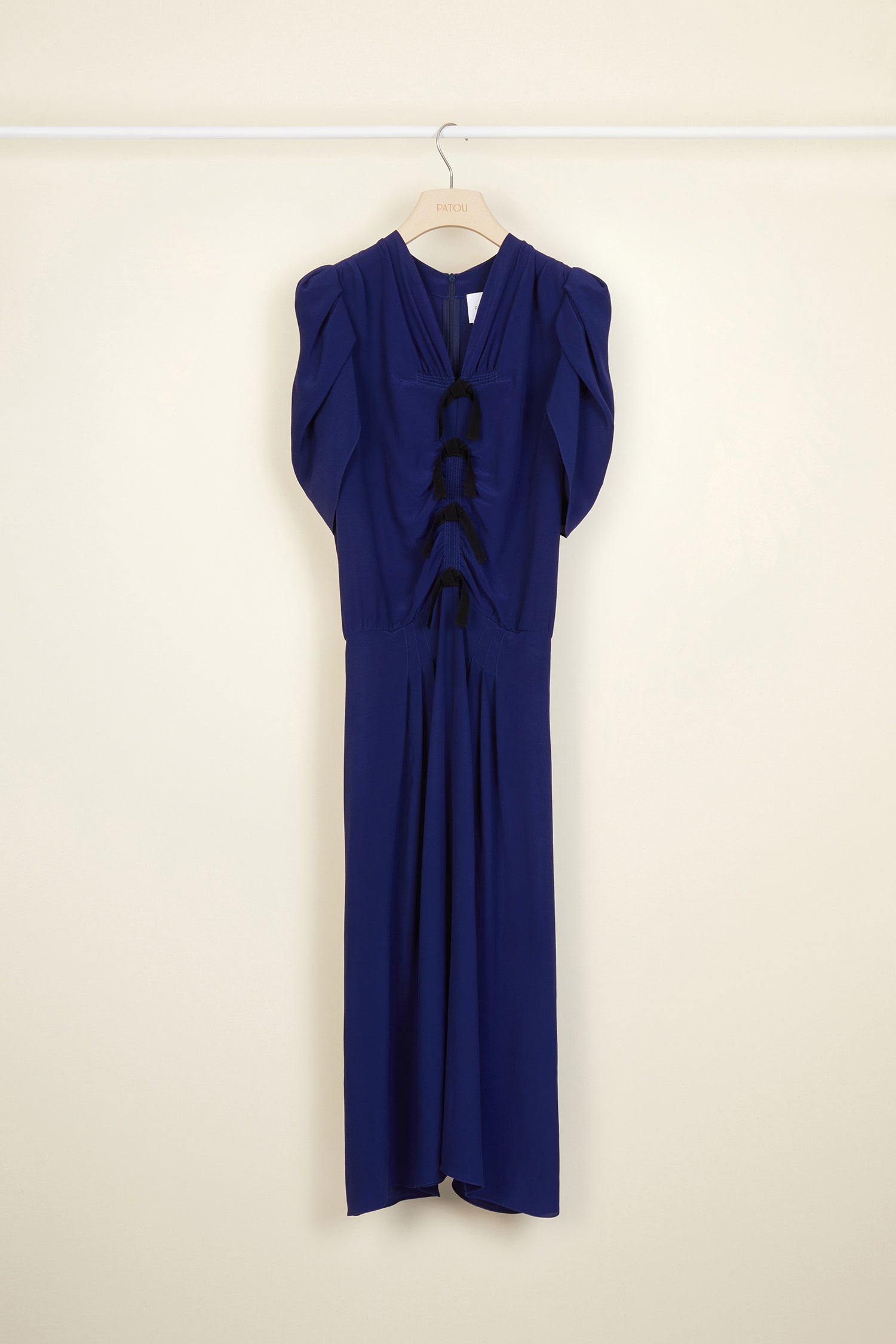 Patou - Bow-embellished ruched dress - Persian Blue - Bows and ruches.Persian Blue ruched viscose dress. Multiple black bows at the front. Short tulip sleeves. Zip fastening at the back. Long skirt with pleats at the front and box pleat at the back.