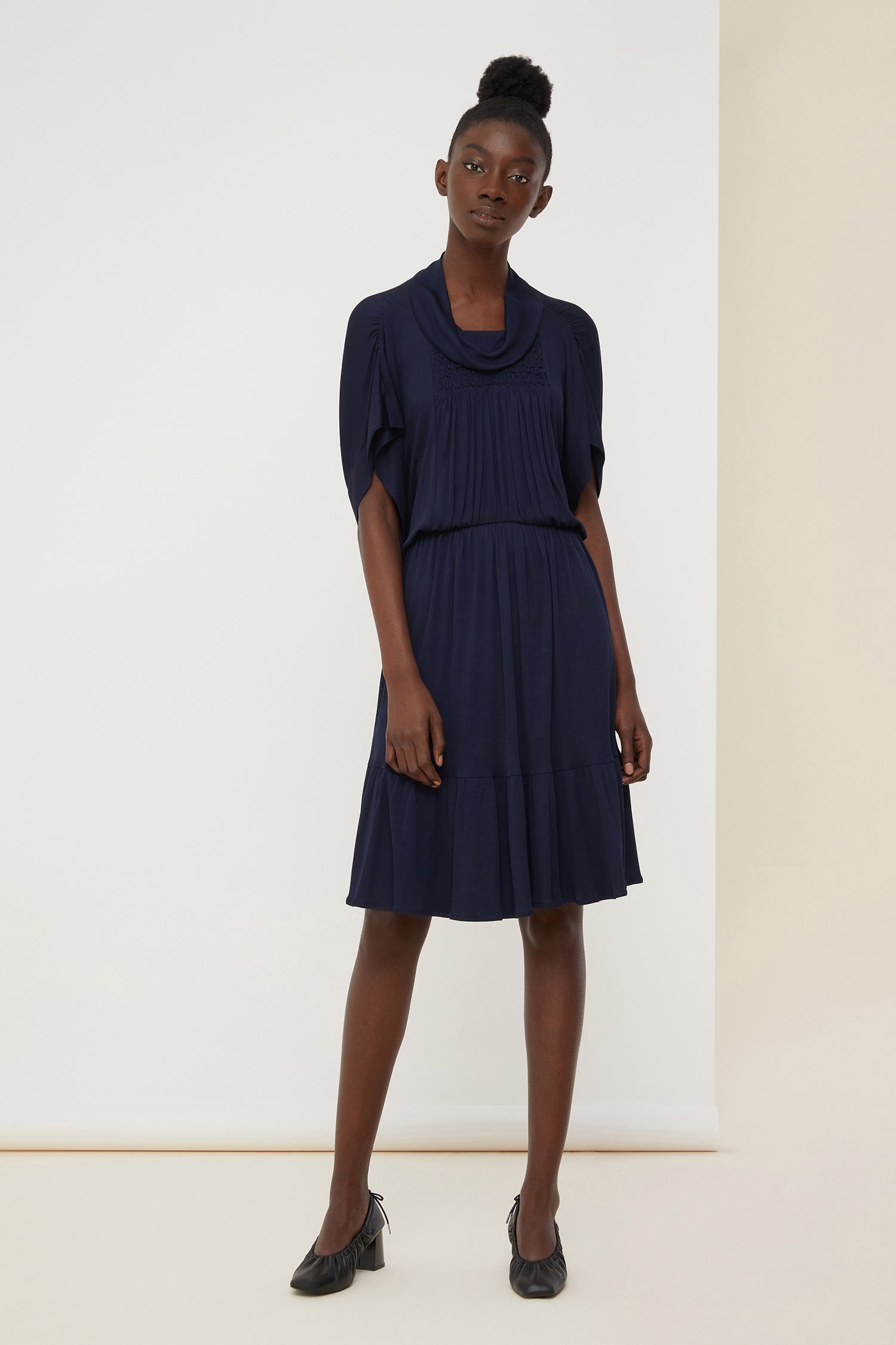 Patou - Jersey smock dress - Sapphire Blue - Contemporary smocks.Sapphire Blue jersey midi dress. Soft funnel collar. Smock detailing all over the front. Tulip sleeves and hem. Brooches sold separately.