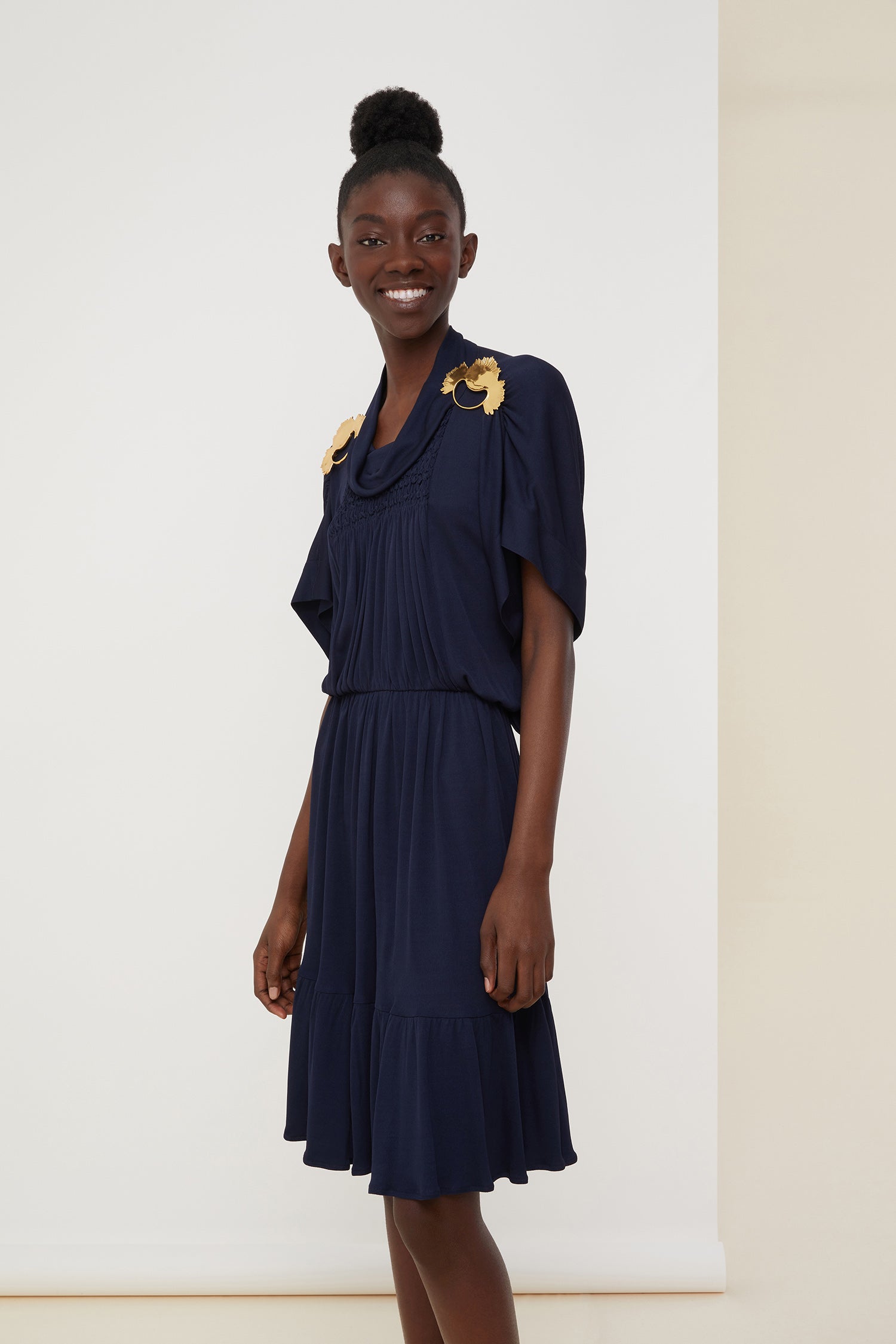 Patou - Jersey smock dress - Sapphire Blue - Contemporary smocks.Sapphire Blue jersey midi dress. Soft funnel collar. Smock detailing all over the front. Tulip sleeves and hem. Brooches sold separately.