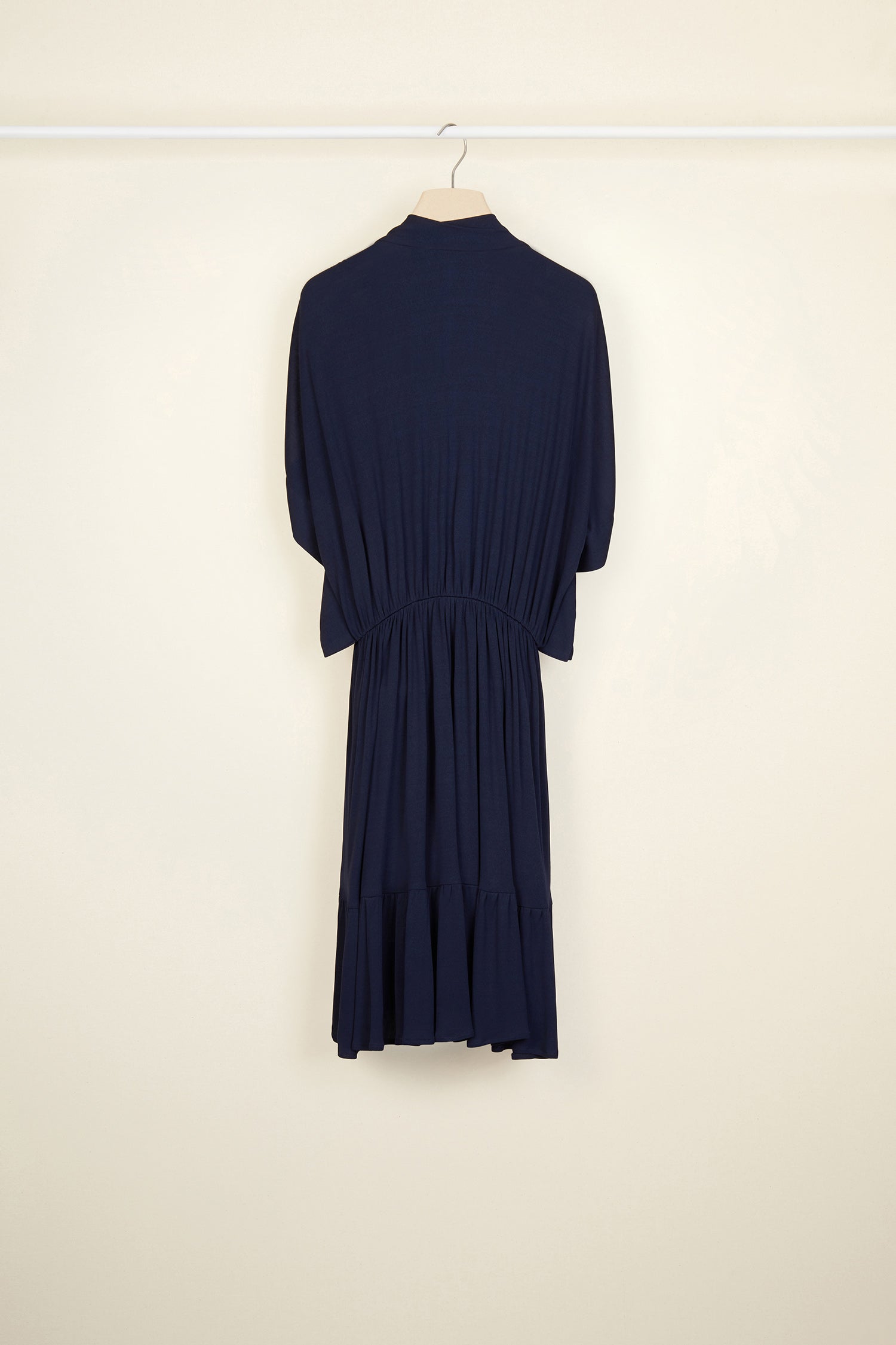 Patou - Jersey smock dress - Sapphire Blue - Contemporary smocks.Sapphire Blue jersey midi dress. Soft funnel collar. Smock detailing all over the front. Tulip sleeves and hem. Brooches sold separately.