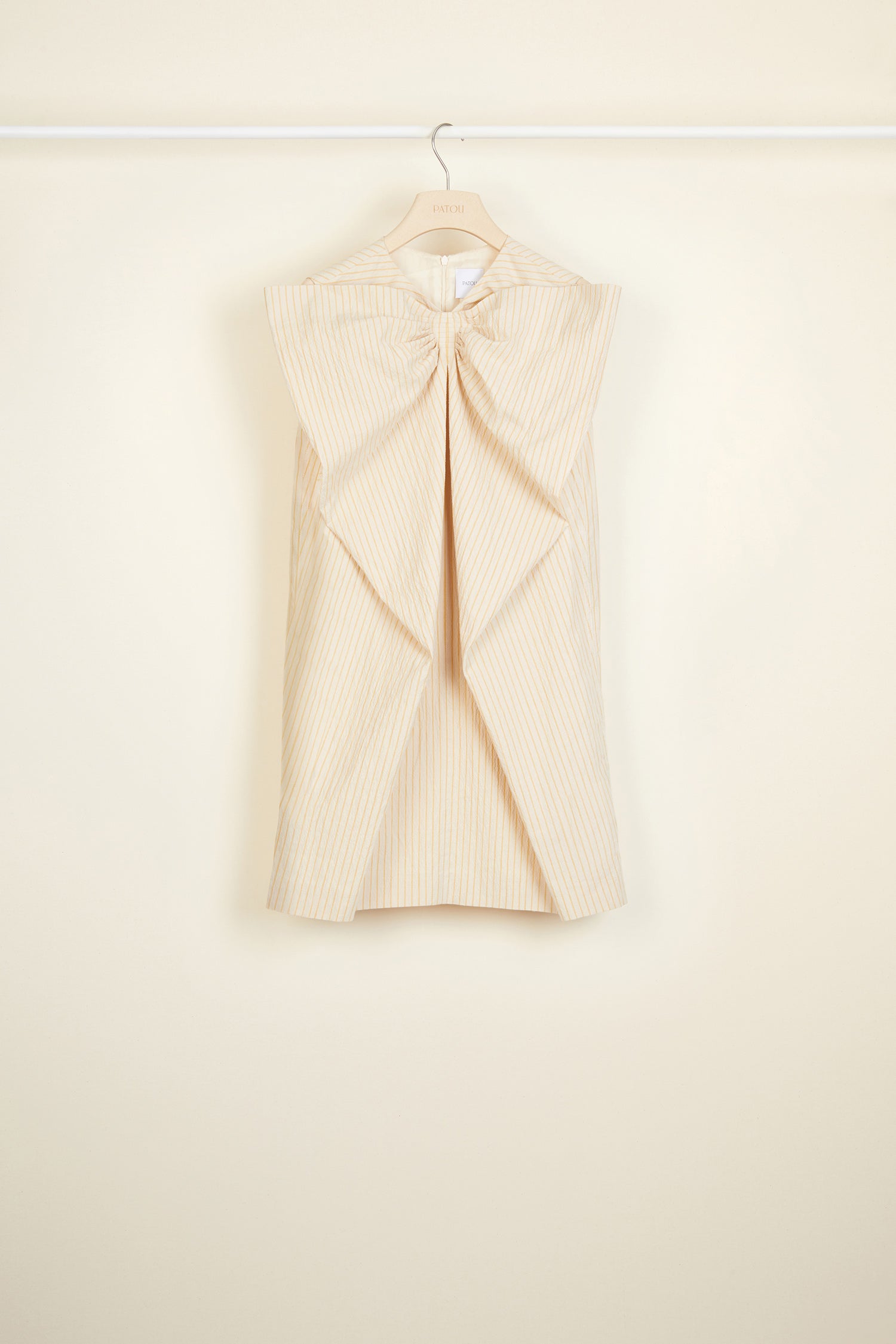 Patou - Oversized bow seersucker mini dress - Honey - It all begins with a bow.Honey seersucker sleeveless mini dress. Oversized bow at the front. Zip fastening at the back.