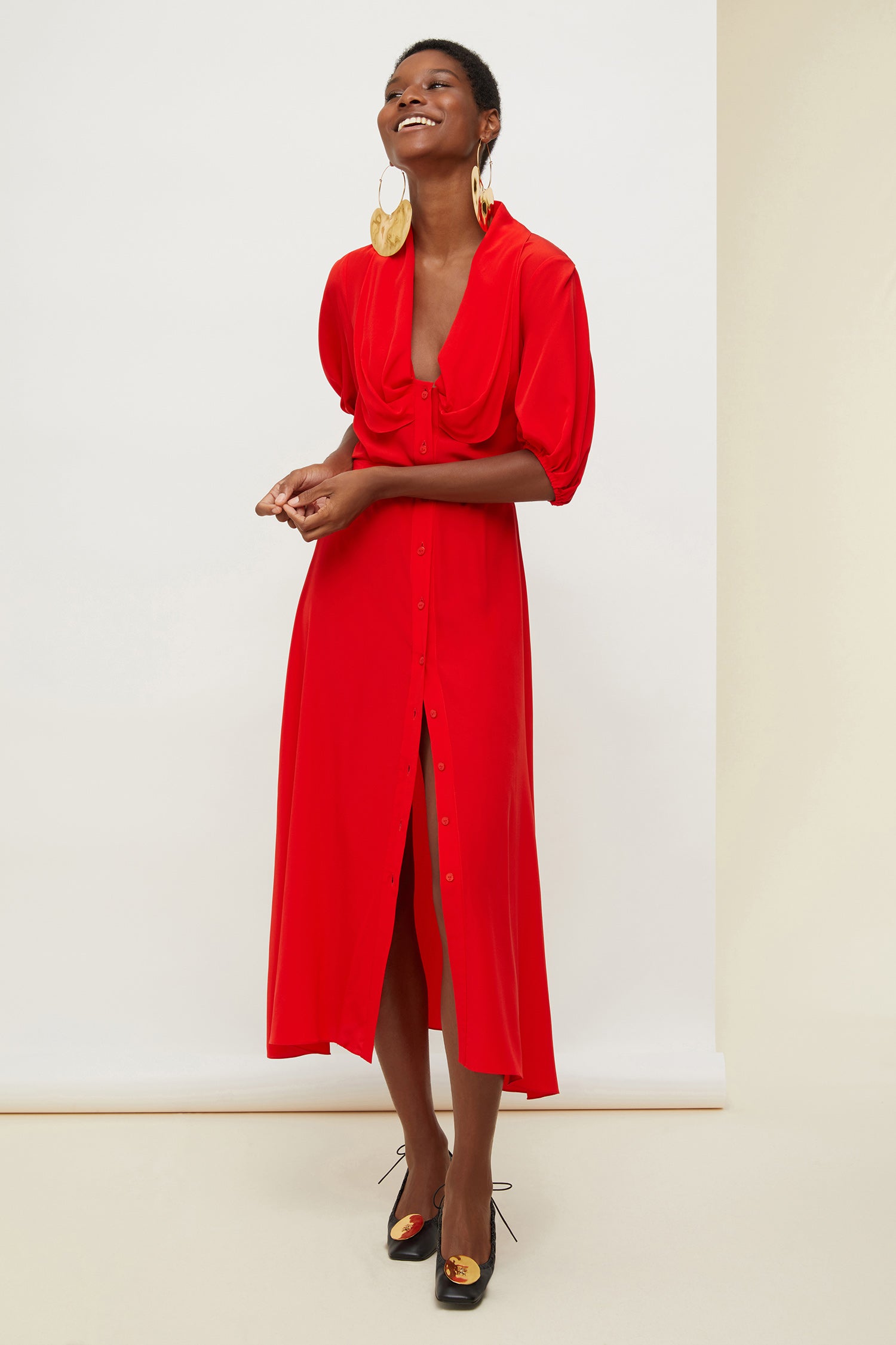 Patou - Draped neckline silk shirt dress - Poppy - How a neckline became a conversation piece.Poppy silk shirt dress. Midi length, belted silhouette. Draped neckline with a deep opening. Button fastening down the front. Soft balloon sleeves with elasticated cuffs.