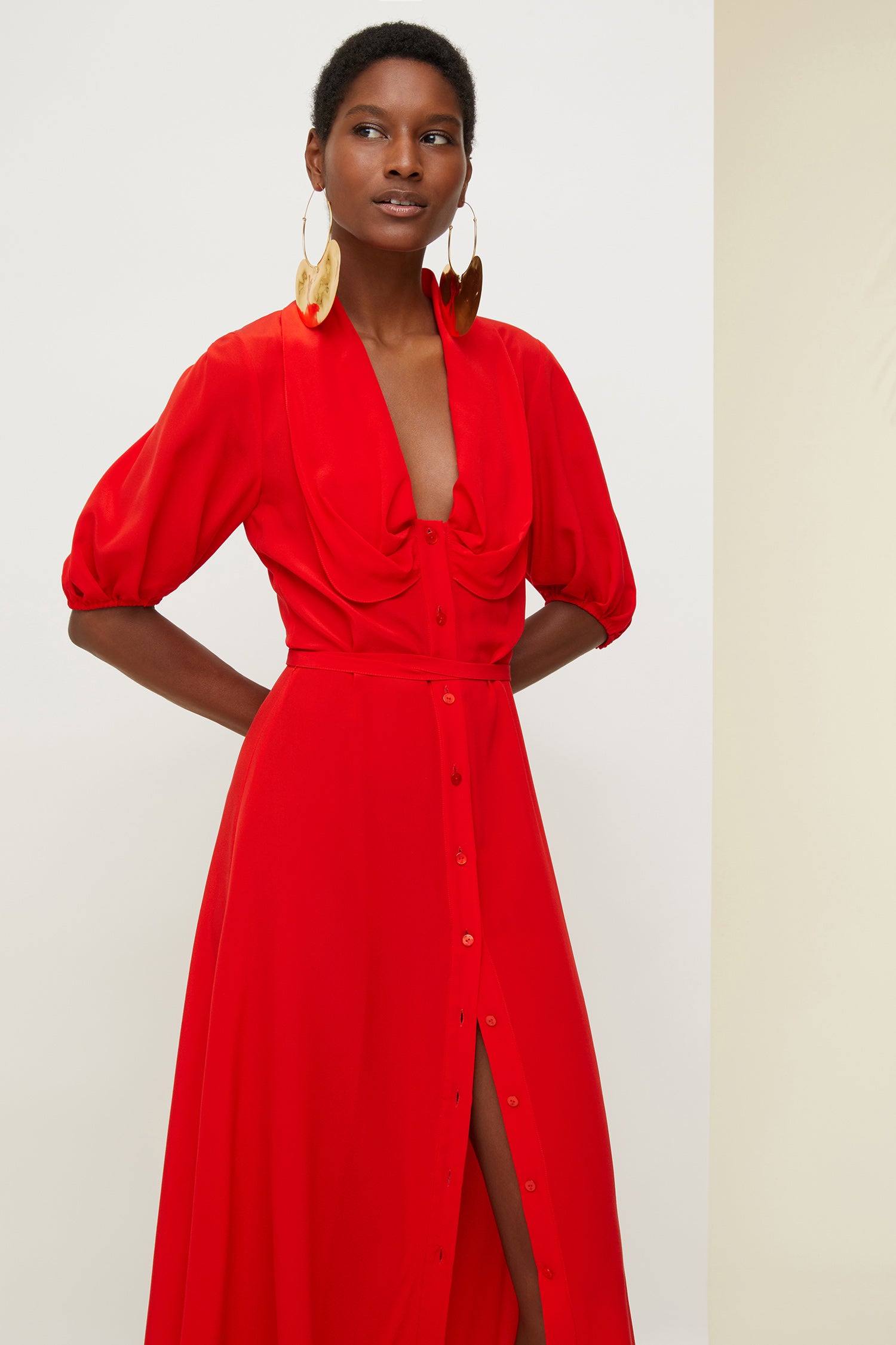 Patou - Draped neckline silk shirt dress - Poppy - How a neckline became a conversation piece.Poppy silk shirt dress. Midi length, belted silhouette. Draped neckline with a deep opening. Button fastening down the front. Soft balloon sleeves with elasticated cuffs.