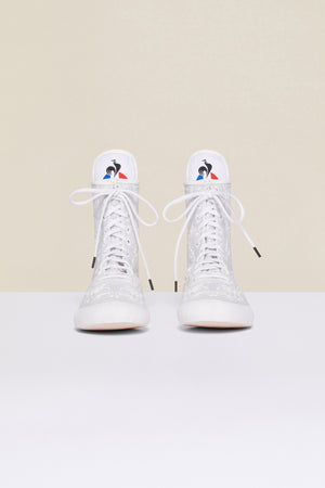 Embroidered high-top trainers - White