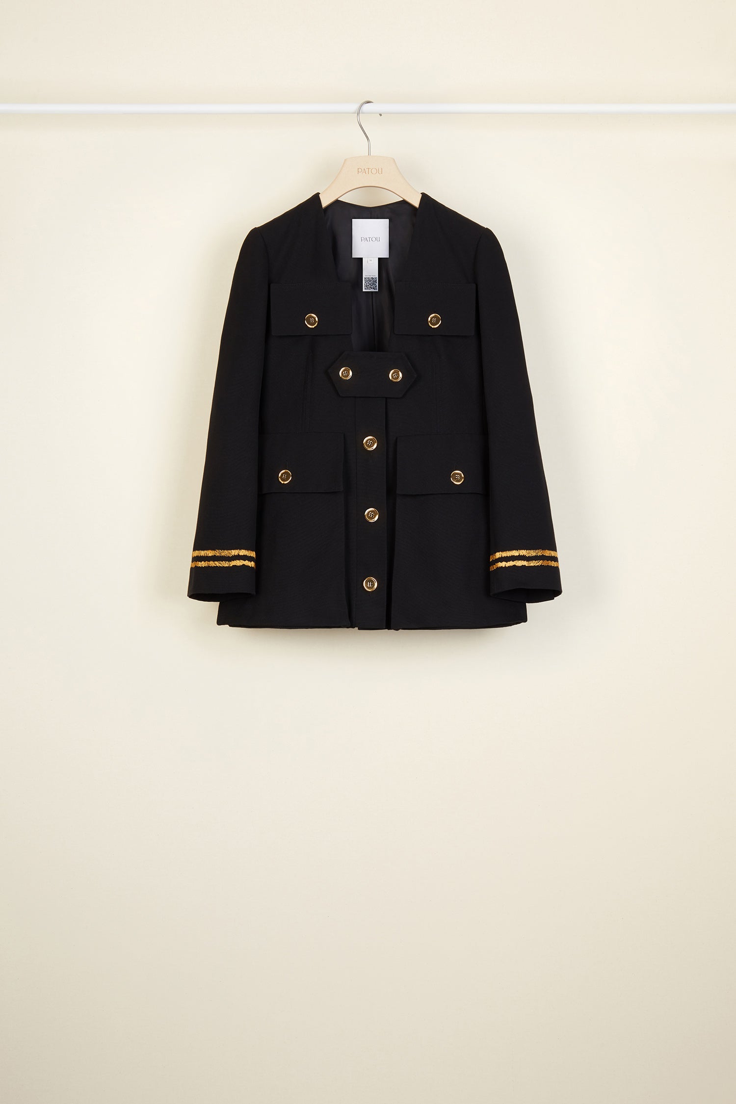 Patou - Embroidered cotton safari jacket - Black - A summertime icon with a golden touch!Black Panama cotton collarless safari jacket. Boxy fit. JP logo-engraved gold-coloured buttons. Removable button tab. High, off-centre flap pockets inspired by the Patou archive. Long sleeves with a slight split and uneven stripes embroidered in gold thread. Fully lined.