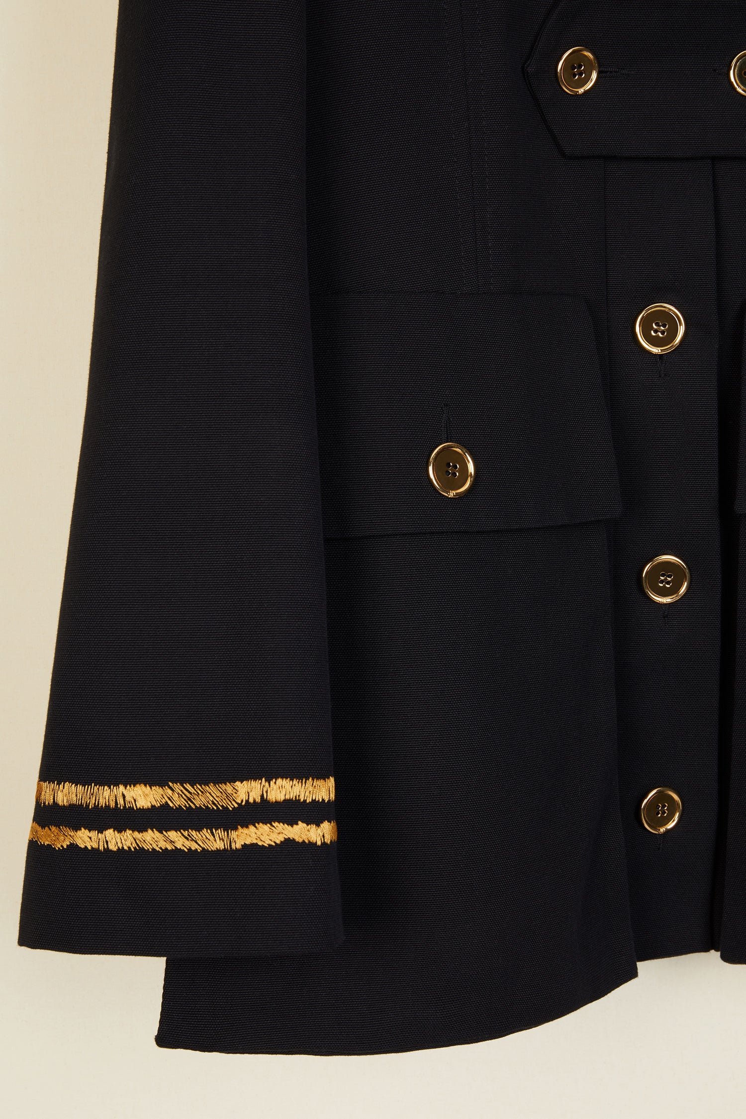Patou - Embroidered cotton safari jacket - Black - A summertime icon with a golden touch!Black Panama cotton collarless safari jacket. Boxy fit. JP logo-engraved gold-coloured buttons. Removable button tab. High, off-centre flap pockets inspired by the Patou archive. Long sleeves with a slight split and uneven stripes embroidered in gold thread. Fully lined.