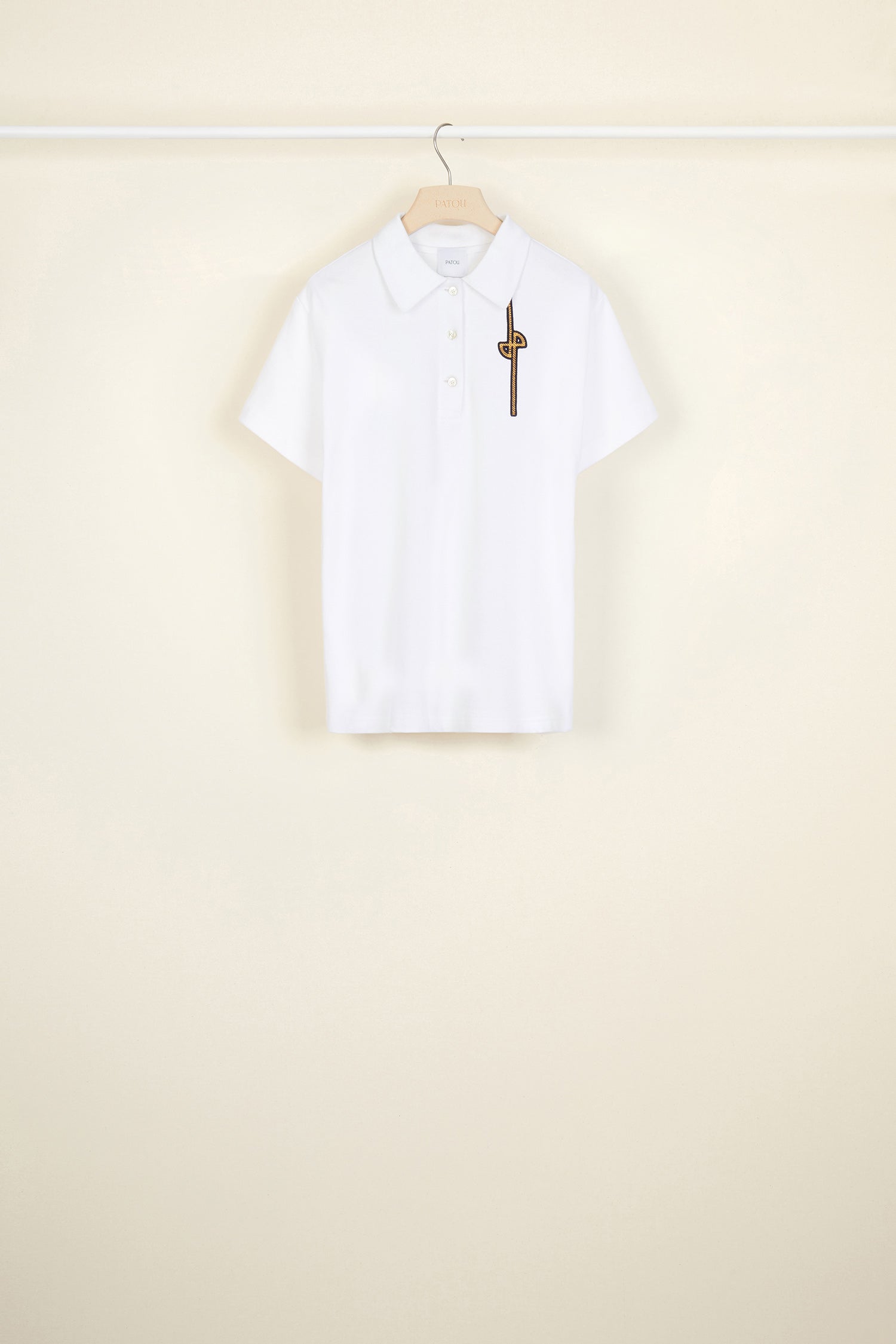Patou - Logo cotton polo shirt - White - A polo we love!White cotton polo shirt with revisited JP logo in gold. Buttoned collar. Slightly flared silhouette.
