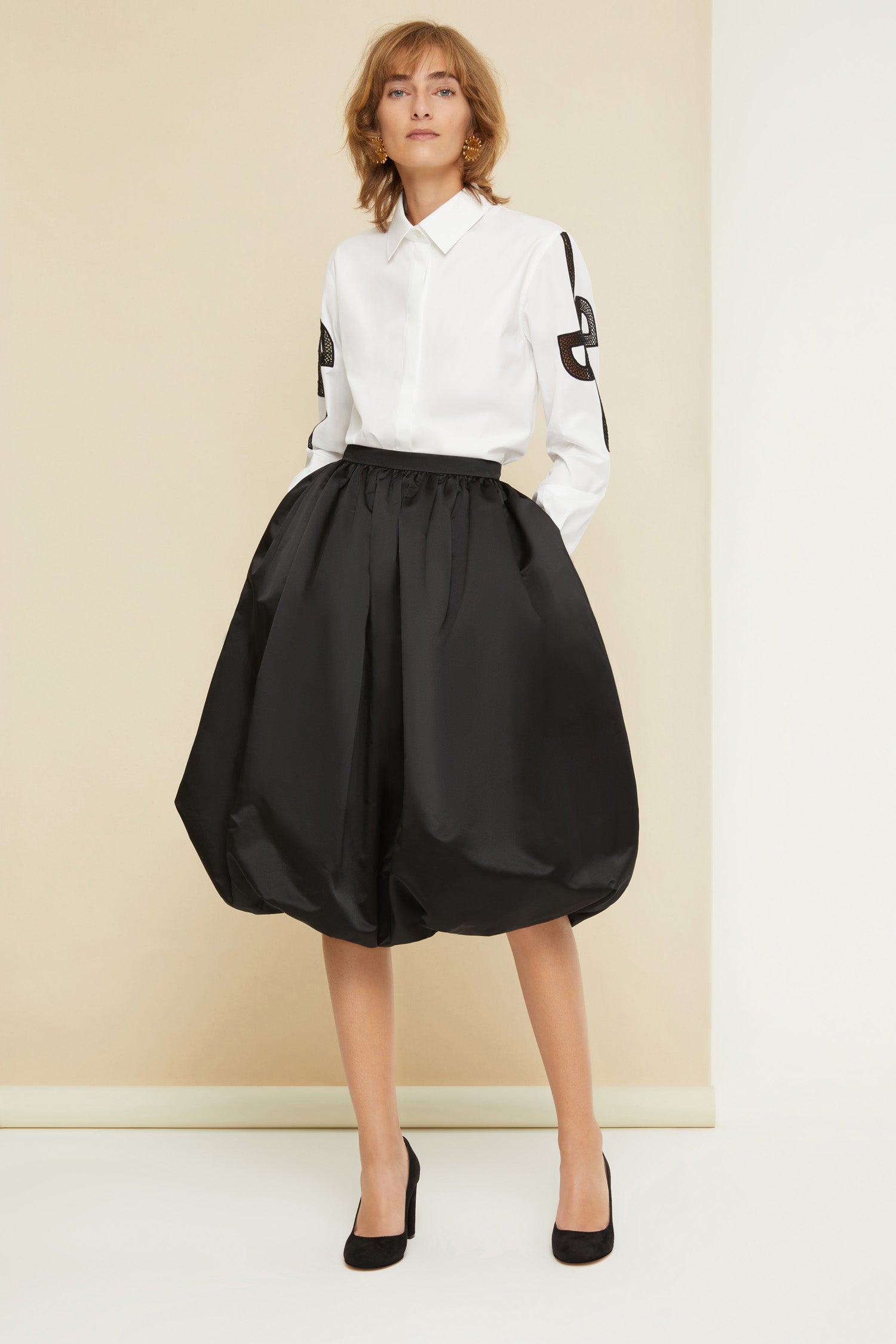 Patou - Embroidered logo shirt in organic cotton - White - JPs and embroideries: modern Patou signatures.White organic cotton shirt with contrasting embroideries. Spread collar. Concealed button fastening; buttoned cuffs. Side vents. Stylised JP logo embroidered in black on both sleeves; black Patou logo on the left cuff.