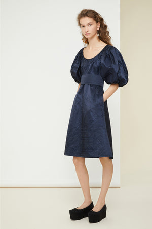 Cocktail dress in metal satin