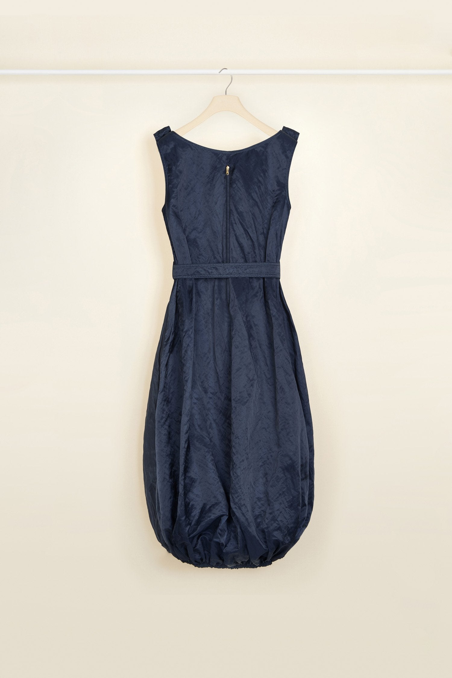 Patou - Bubble hem dress in metal satin - Sapphire Blue - Short or not-so-short, a dress tailored to your wishes.  Sapphire blue bubble hem dress. Metal satin with a natural rumpled look. Scoop neckline with wide straps. Zip fastening at the back. Belt at the waist with two engraved gold-coloured buttons. Pockets at the sides. Elasticated hem that allows the dress to be worn as a short bubble silhouette or as a midi style.