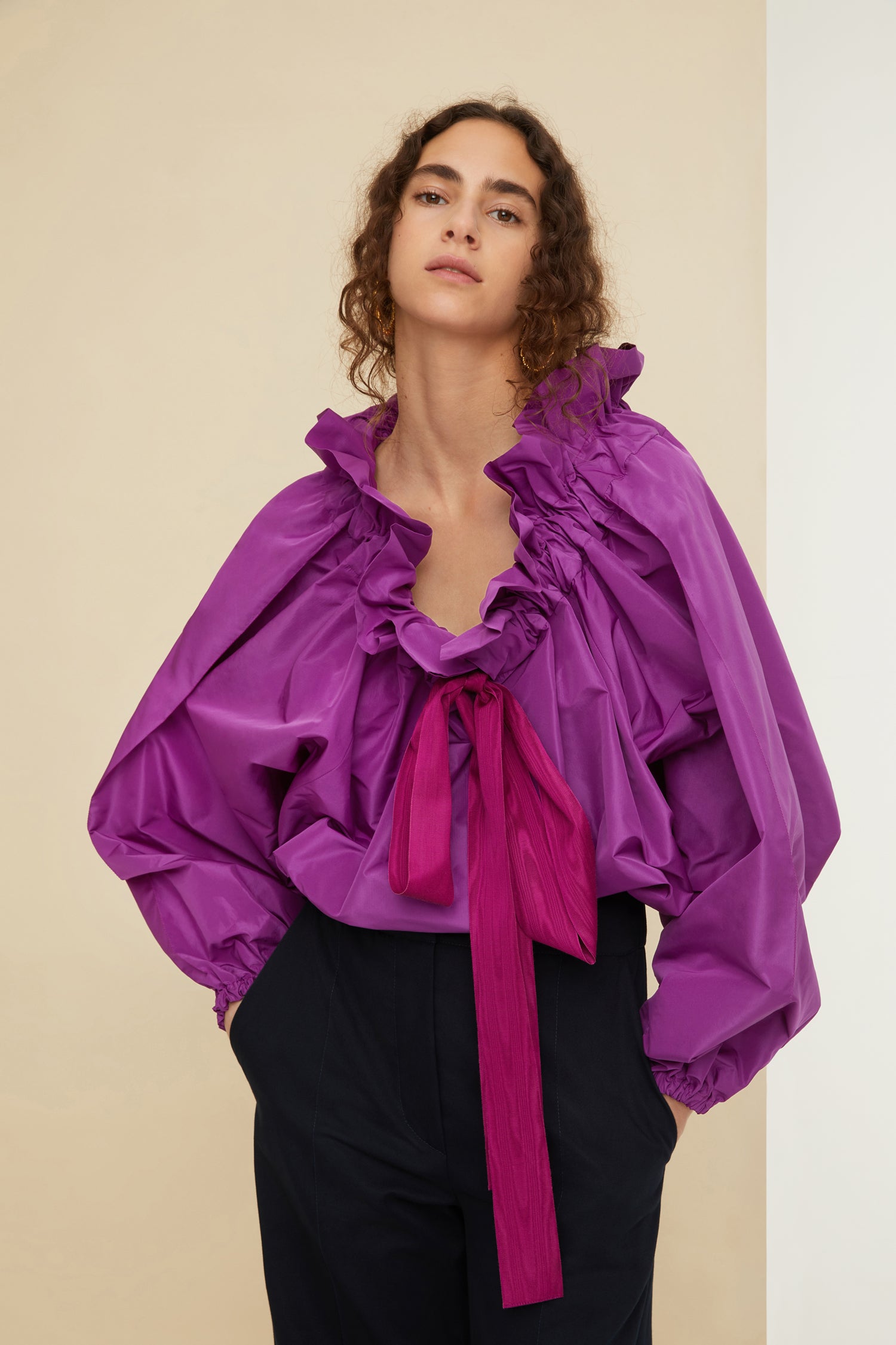 Patou - Drawstring collar top in eco-friendly faille - Anemone - High collar or bare embossed shoulder? With Patou, it’s all about you.Anemone purple recycled polyester faille top. High volume silhouette that can be worn knotted at the neck or off the embossed shoulders. Drawstring collar with flounce at the front and long grosgrain ties. Batwing sleeves with elasticated cuffs. Elasticated waist.