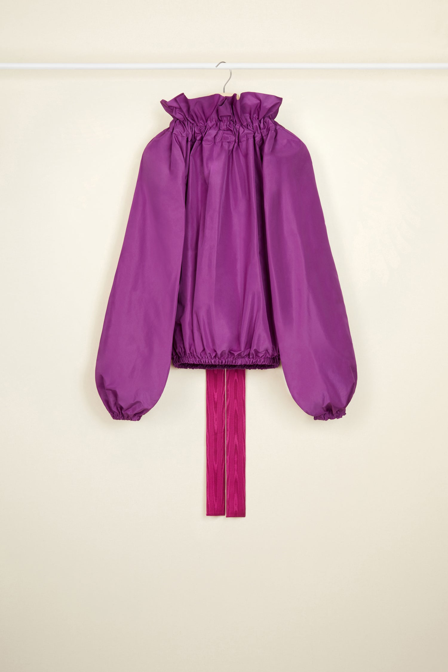 Patou - Drawstring collar top in eco-friendly faille - Anemone - High collar or bare embossed shoulder? With Patou, it’s all about you.Anemone purple recycled polyester faille top. High volume silhouette that can be worn knotted at the neck or off the embossed shoulders. Drawstring collar with flounce at the front and long grosgrain ties. Batwing sleeves with elasticated cuffs. Elasticated waist.