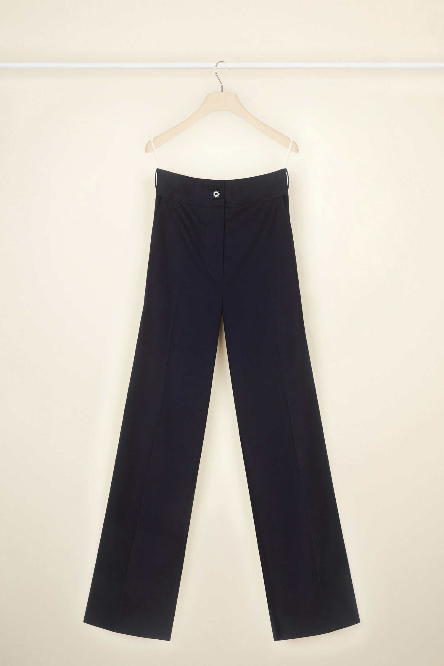 Patou - Long tailored trousers in organic cotton - Night Blue - Flawless and carefree: tailoring by Patou.  Night Blue organic cotton trousers. Long straight leg. Fastens via a single JP-engraved button and zip at the front. Belt loops. Pockets at the sides. Signature curved seam and darts at the back.