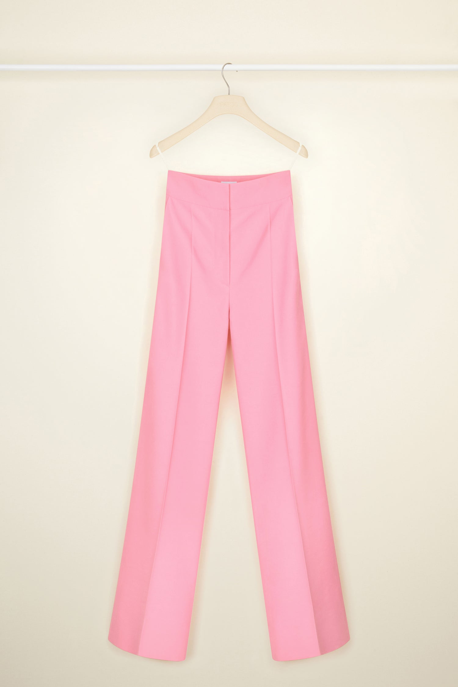 Patou - Long tailored trousers in organic cotton and wool - Rose - Flawless and carefree: tailoring by Patou.  Rose pink organic cotton and wool canvas trousers. Long straight leg. Fastens via a single JP-engraved button and zip at the front. Belt loops. Pockets at the sides. Signature curved seam and darts at the back.