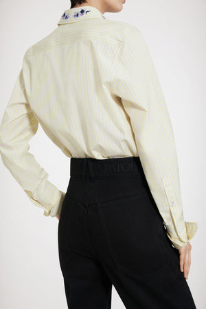 Pantalone svasato in denim bio